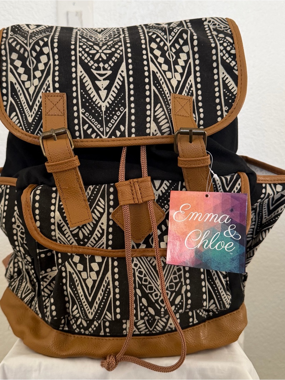 Black Patterned Backpack with Tan Trim